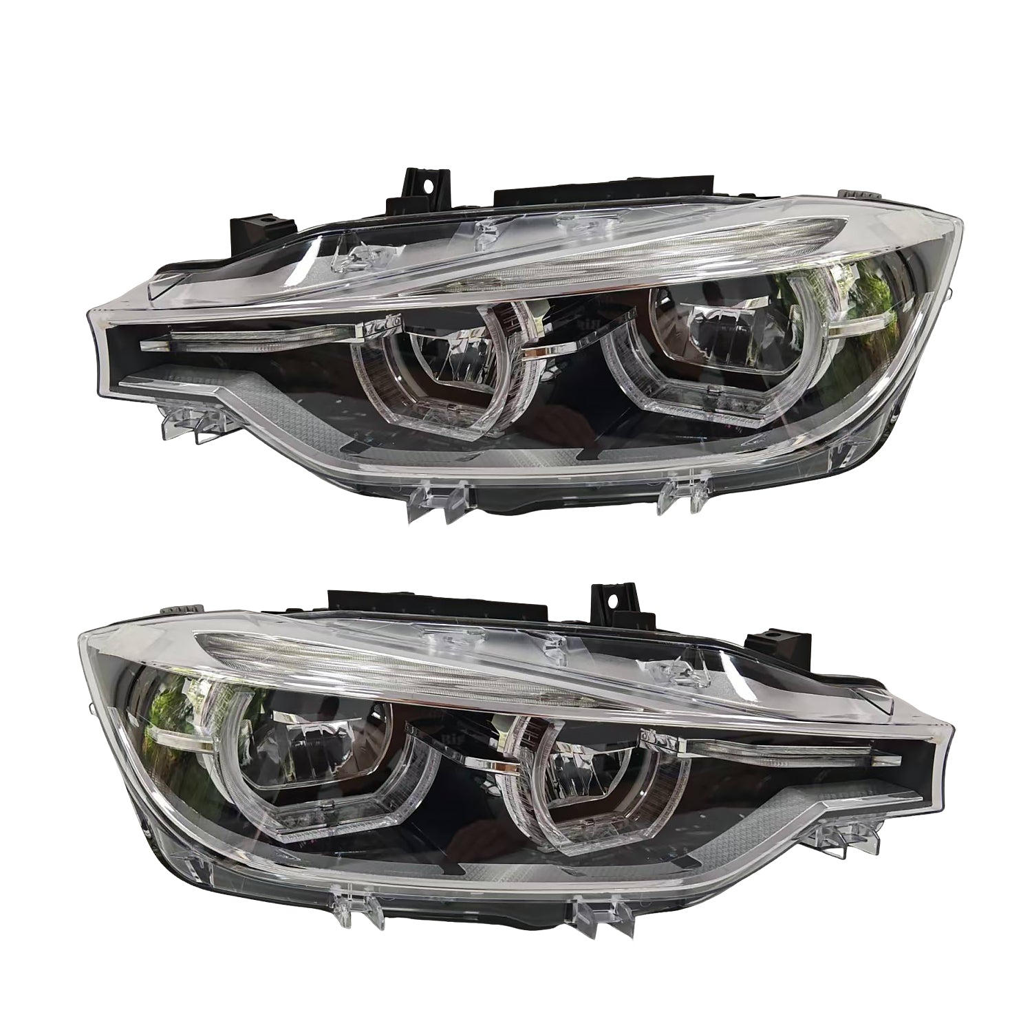 Pair of car headlights on a white background